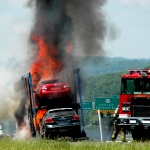photo by Ed Dashiell of an auto carrying tractor-trailer fire in Cheat Lake